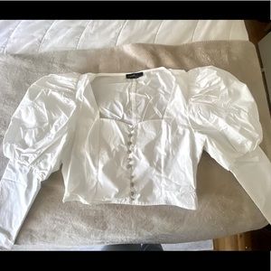 Long sleeve, white puff sleeve shirt. Never been worn from VICI DOLLS